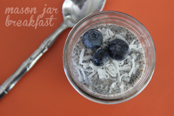 coconut and blueberry chia seed pudding in a Mason jar