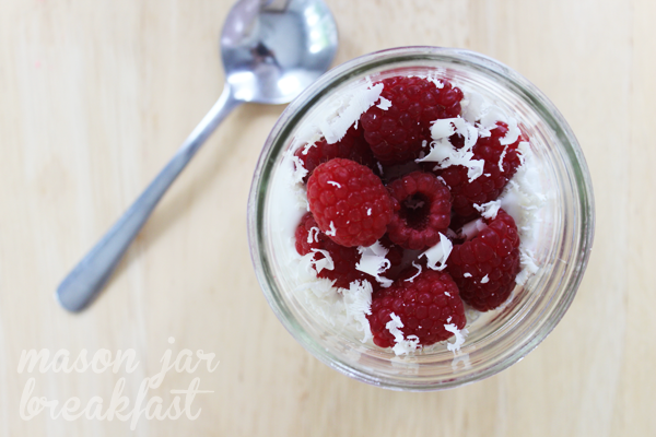 raspberry and white chocolate yogurt parfait in a Mason jar